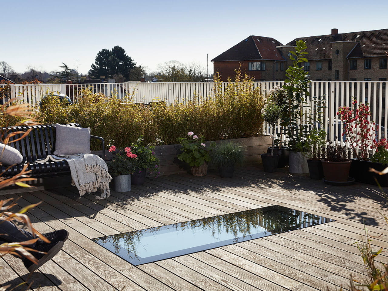 Roof terrace with a VELUX Vario roof window.